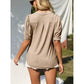 T-shirt élégant à manches courtes bouffantes et col en V pour femme
