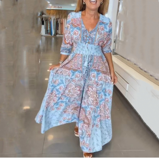 Elegantes Damenkleid mit Blumenmuster und Kordelzug in Maxilänge